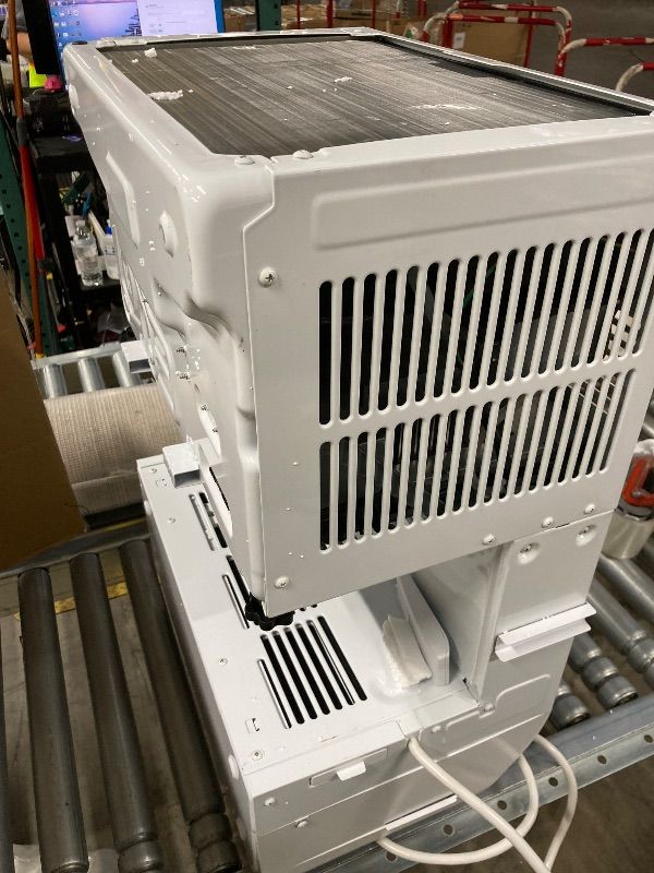 Photo 1 of ***USED*** GE Profile ClearView Inverter Window Air Conditioner Unit, 12,200 BTU, Energy Efficient Cooling up to 550 sq ft., Ultra Quiet, SMART Home Capable, Includes Remote, White