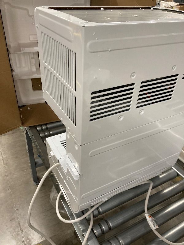 Photo 1 of ***USED*** GE Profile ClearView Inverter Window Air Conditioner Unit, 12,200 BTU, Energy Efficient Cooling up to 550 sq ft., Ultra Quiet, SMART Home Capable, Includes Remote, White
