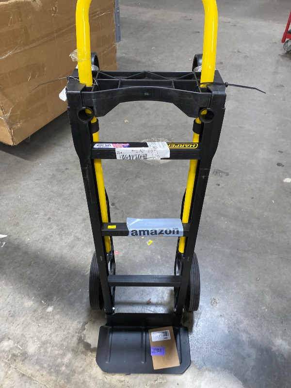 Photo 1 of "Harper Trucks 700 lb Capacity Glass Filled Nylon Convertible Hand Truck and Dolly with 10"" Flat-Free Solid Rubber Wheels", Black with Yellow Handle (PGDY8635P)