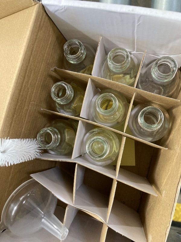 Photo 1 of ***MISSING PIECES SELLING AS IS **** FANSTINOW 2 oz (60ml) 8 Pack Leak-Proof Clear Glass Boston Round Bottles with lids - Mini Travel Containers for Ginger Shots, Juice, Whiskey, Samples | W/Labels, Funnels & Brushes