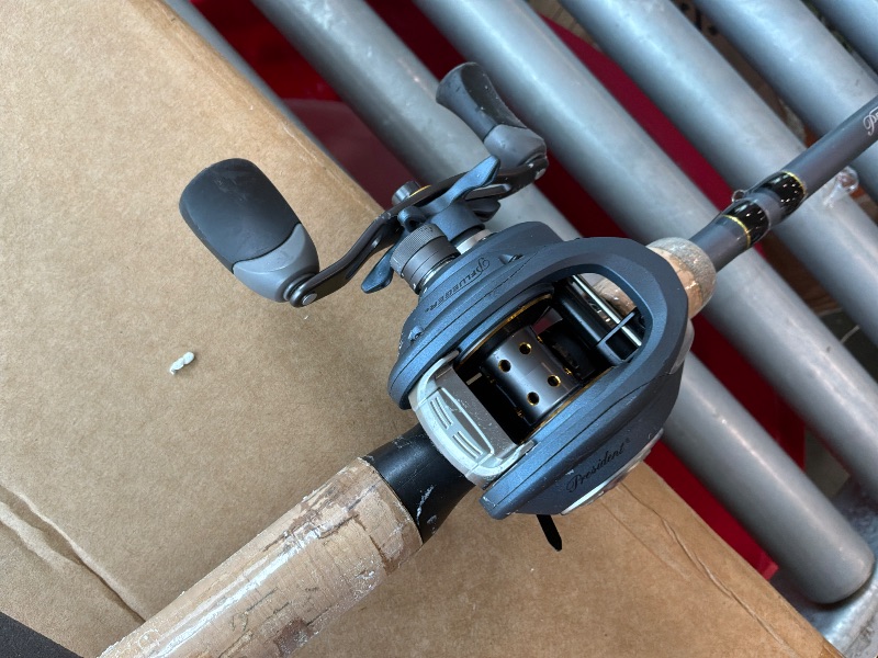 Photo 1 of [Tip Broken] Pflueger 7' President Baitcast Low Profile Reel and Fishing Rod Combo, Medium Heavy Power, 1-Piece 24T Carbon Rod, Aluminum Spool