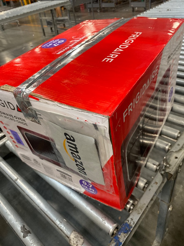Photo 1 of [SOLD FOR PARTS] Frigidaire, 0.7 Cu. Ft. Retro Countertop Microwave Oven, 700W Compact Microwave with 8 Auto Cook Menus, Auto Defrost, 5 Power Levels, LED Display, Glass Turntable, Red-Silver