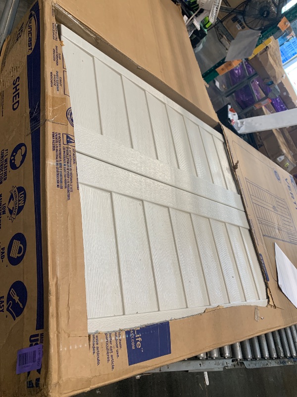 Photo 1 of **PLASTIC**Suncast Vertical Outdoor Storage Shed