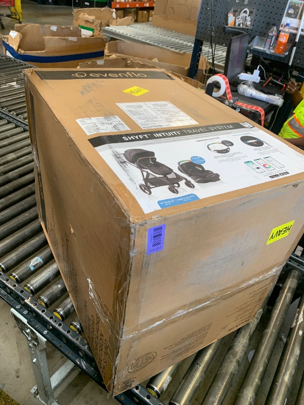 Photo 1 of Evenflo Shyft Intuiti Travel System with LiteMax NXT Infant Car Seat