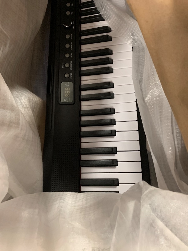 Photo 1 of Yamaha 88-Key Weighted Portable Digital Piano Keyboard with Music Rest, Sustain Foot Switch, Built-in Speakers, USB Connectivity, Black (P45B)