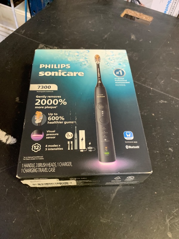 Photo 1 of Philips Sonicare 7300 Series Electric Toothbrush - Next-Generation Sonicare Technology, Pressure Sensor, 12 Brushing Settings, SmarTimer, BrushPacer, 21-Day Runtime, Travel Case, Black, HX7421/07