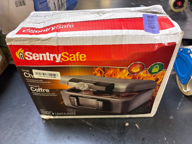 Photo 1 of SentrySafe Fireproof Safe with Key Lock, Chest Lock Box for Home or Travel Secures Money, Documents, 0.18 Cubic Feet, 6.1 x 14.3 x 11.2 Inches, 1210