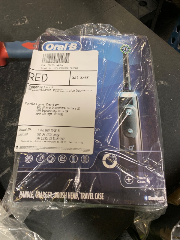 Photo 1 of Oral-B Genius X Limited Rechargeable Electric Toothbrush with 1 Replacement Brush Head, Travel Case, Midnight Black