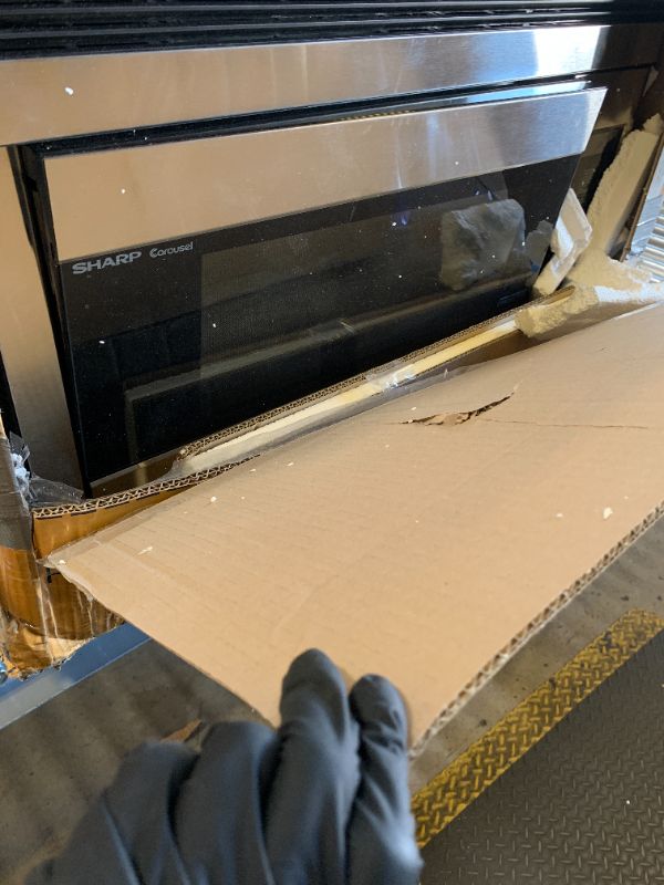 Photo 1 of Sharp R1874T 30 in. 1.1 cu. ft. Over the Range Convection Microwave Oven