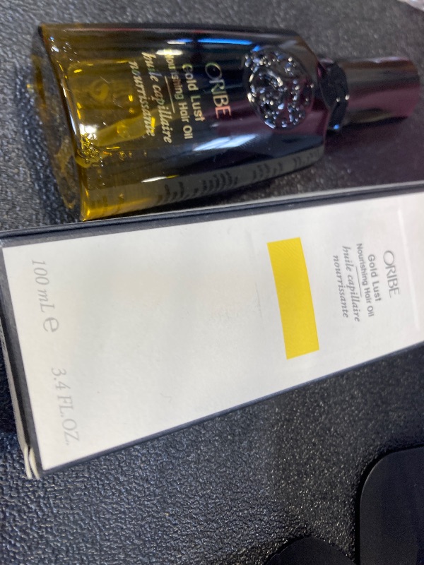 Photo 1 of Oribe Gold Lust Nourishing Hair Oil - For Color-Treated, Dry & Damaged Hair - Repairs & Prevents Damage - Smooths Frizz, Adds Shine & Provides Heat Protection - For All Hair Types - 3.4 oz
