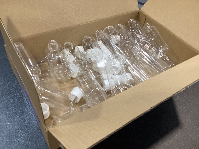 Photo 1 of Mini plastic bottles