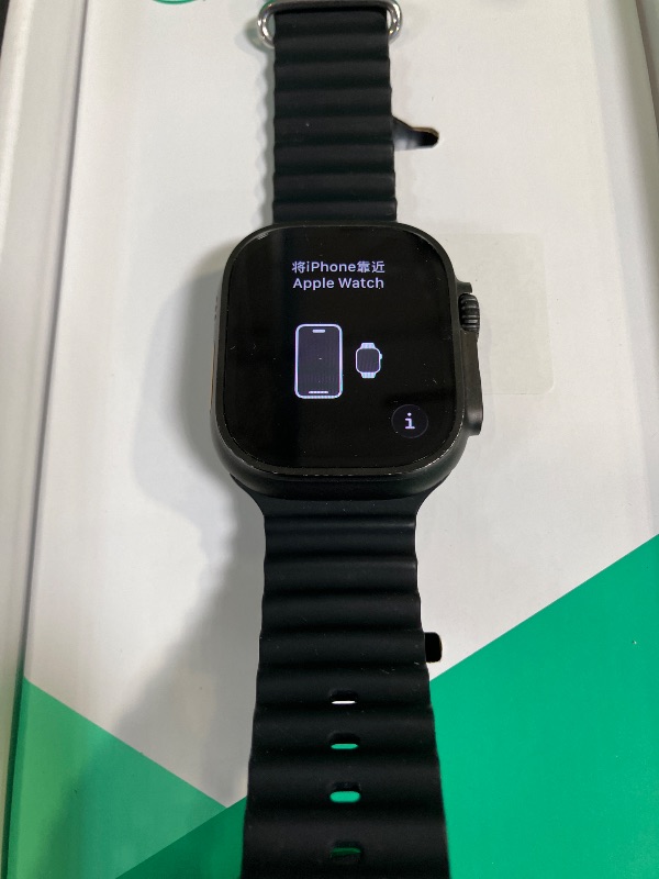 Photo 1 of Apple Watch Ultra 2 (GPS + Cellular, 49MM) - Black Titanium Case with Black Ocean Band (Renewed Premium)
