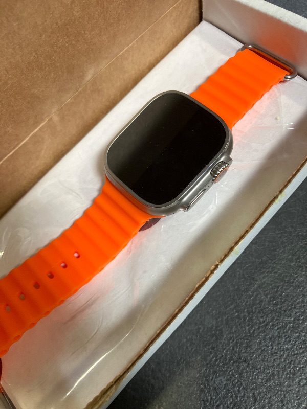 Photo 1 of Apple Watch Ultra 2 [GPS + Cellular, 49mm] - Titanium Case with Orange Ocean Band, One Size (Renewed)