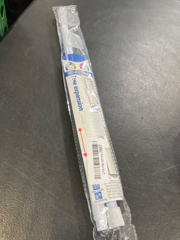 Photo 1 of MEXAU 1Pcs Spring Tension Curtain Rod 26-39 inch Spring Tension Rods White Tension Rods Adjustable Spring Rod Extendable Tension Rod For Kitchen, Window, Bookshelf,Closet.