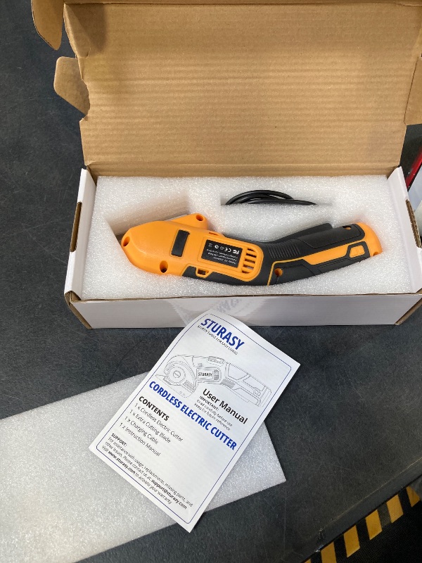 Photo 1 of Cordless Electric Scissors, Power Cardboard Cutter with Safety Lock, Rechargeable 4V 2000mAh Electric Box Cutter for Cardboard, Fabric, Carpet, Leather, Paper, Plastic, Packages, Rotary Cutter