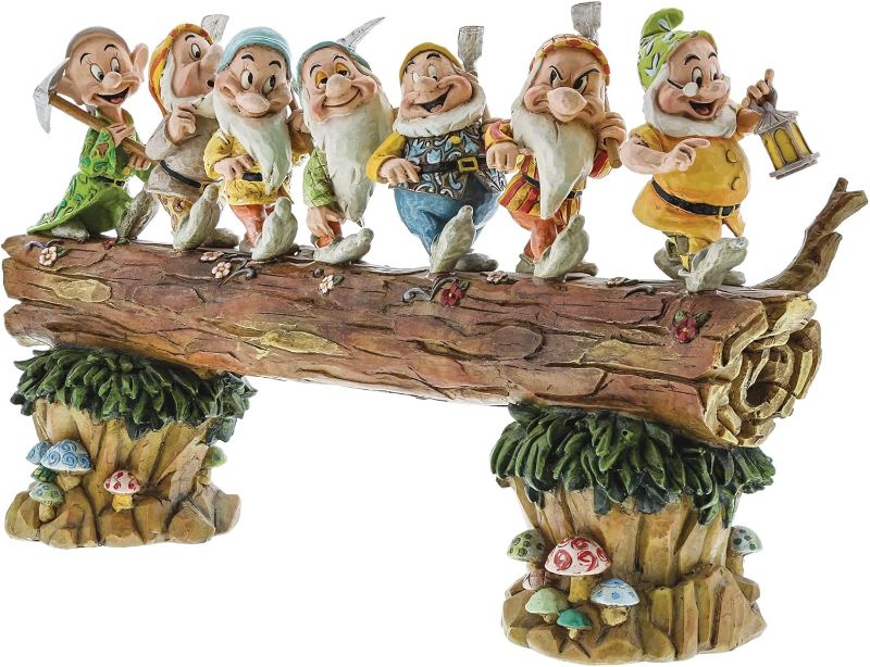 Photo 1 of Enesco Disney Traditions by Jim Shore Snow White and The Seven Dwarfs Standing on Log Figurine, 8.25 Inch, Multicolor