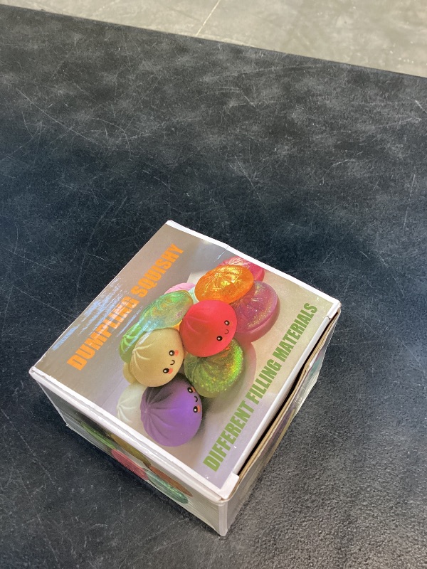 Photo 1 of Dumpling Squishy, Dumpling Squishy Mystery Box, Cute Big Squishy Dumpling Stress Ball Fidget Sensory Toy for Adults Anxiety Relief, Novelty Squeeze Ball for Office Desk (Purple)