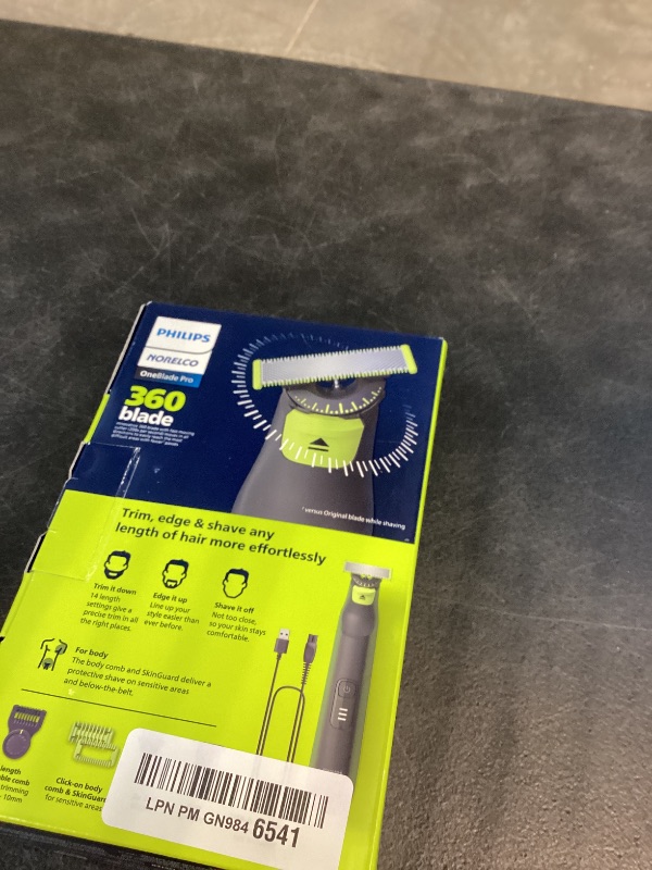 Photo 1 of Philips Norelco OneBlade Pro 360 Face + Body Electric Shaver, Beard Trimmer and Groomer, with 360 Blade Technology, 14-Length Precision Comb, Body Kit, Soft Pouch, Model QP6542/70
