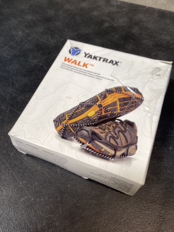 Photo 1 of Yaktrax Walk Traction Cleats - 360-Degree Grip on Snow, Ice, & Multi-terrain Surfaces - Elastic Outer Band w/ Easy-On/Off Heel Tab & 1.2mm Zinc-coated Steel Coils - Abrasion & Rust Resistant - Unisex