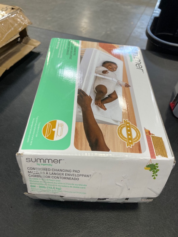 Photo 1 of Summer by Ingenuity Contoured Changing Pad – Includes Waterproof Changing Liner and Safety Fastening Strap with Quick-Release Buckle