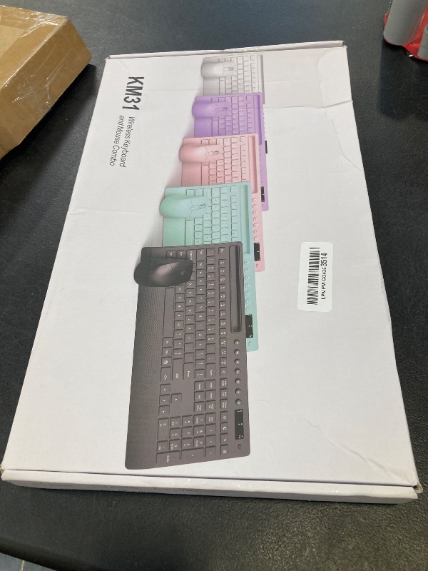Photo 1 of Trueque KM31 Wireless Keyboard and Mouse Combo - Full-Size Quiet Typing with Palm Rest, Phone Holder, Multimedia Keys, Power Switch, Batteries Included, Compatible with Windows, Chrome OS, PC, Laptop