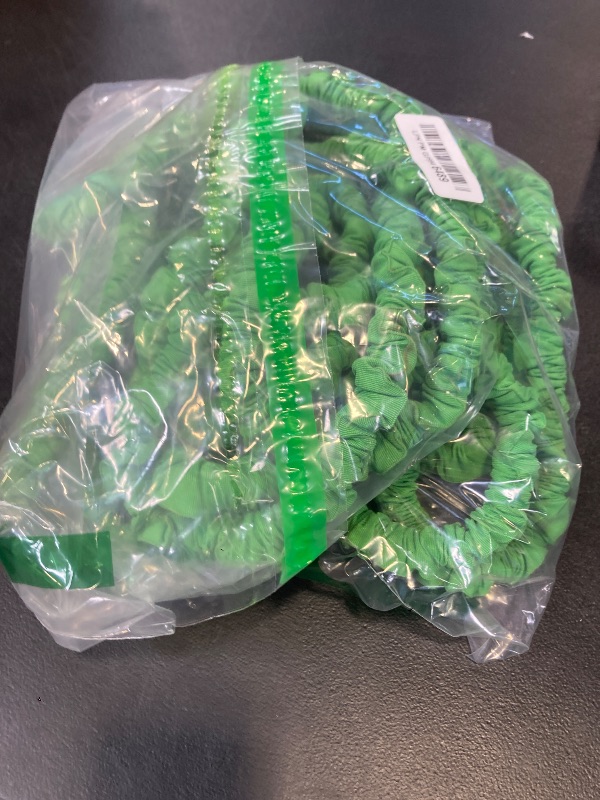 Photo 1 of Garden Hose 75ft, Pliable lightweight Water Hose with Triple Layer 3/4" Fittings Ergonomic Grip Indoor & Outdoor Use Gift for Lawn Backyard Collapsible & Car Wash Watering Plants Green