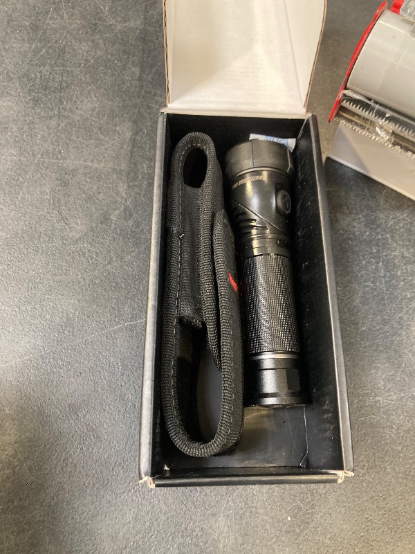 Photo 1 of Coast TX300R 3000 Lumen Rechargeable Long Range Tactical LED Flashlight with Strobe, Spot and Flood Beams - POWERiQ™ Digital Display, Durable Aluminum Build