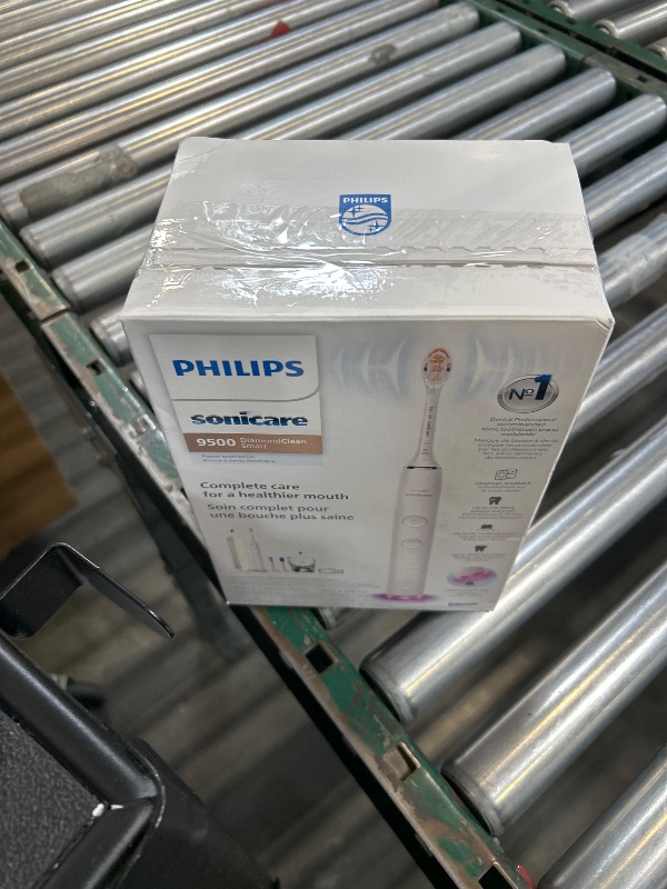 Photo 1 of Philips Sonicare DiamondClean Smart 9500 Electric Toothbrush - Sonic Toothbrush with App, Pressure Sensor, 15 Brushing Settings, Replacement Reminder, USB Charging Travel Case, White, Model HX9923/01