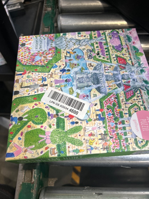 View 2 of Galison Spring Egg Hunt – 500 Piece Michael Storrings Jigsaw Puzzle Featuring Beautiful Artwork of an Easter Spring Garden Egg Hunt
