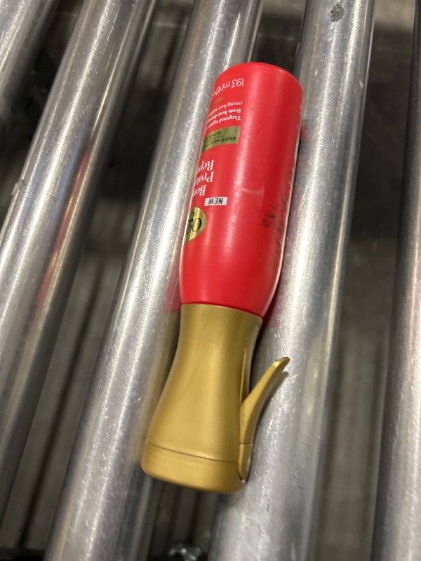 Photo 1 of OGX Bond Protein Repair 450°F Heat Protect Spray for Hair 6.5 Fl Oz