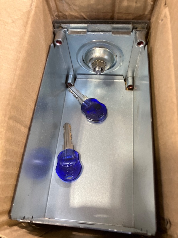 Photo 1 of W11190039 for Whirlpool-compatible and OEM-compatible coin box lock assembly for commercial laundry equipment (with 2 keys). Perfect replacement part numbers 4396671, 8316525 and W10860203.