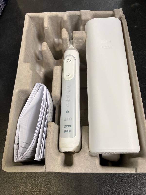 Photo 1 of Oral-B Genius X Limited Rechargeable Electric Toothbrush with 1 Replacement Brush Head, Travel Case, White