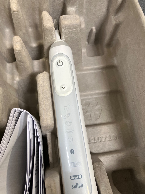 Photo 1 of Oral-B Genius X Limited Rechargeable Electric Toothbrush with 1 Replacement Brush Head, Travel Case, White