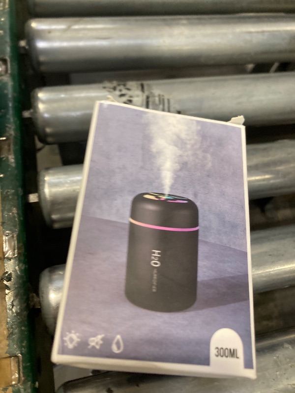 Photo 1 of Portable Mini Humidifier, 300ml USB Cool Mist Small Humidifier with Colorful Lights. Perfect for Bedroom, Office, Plants, travel & Car (White)