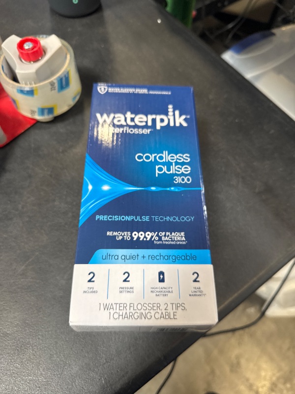 Photo 1 of Waterpik Cordless Pulse 3100 Rechargeable Portable Water Flosser for Teeth, Gums, Braces Care and Travel with 2 Flossing Tips, Waterproof for Shower Use, ADA Accepted, WF-20 White, Amazon Exclusive