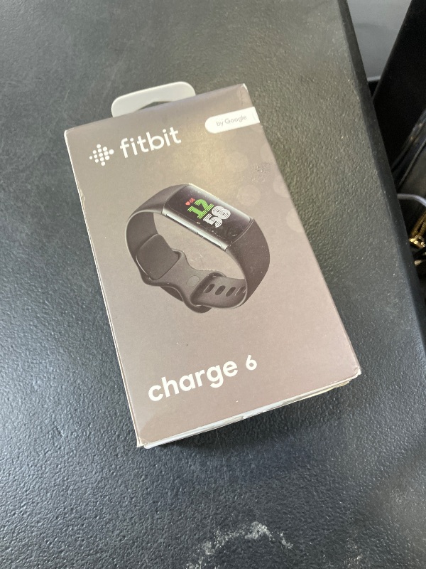 Photo 1 of Fitbit Charge 6 Fitness Tracker with Google Apps - Heart Rate on Exercise Equipment - 3-Month Google Health Premium Membership Included - Health Tools - Obsidian/Black - Small&Large Bands Included