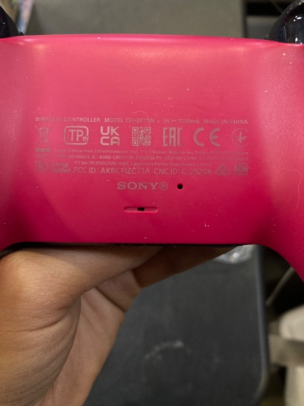 Photo 1 of PlayStation DualSense Wireless Controller – Cosmic Red (Renewed)