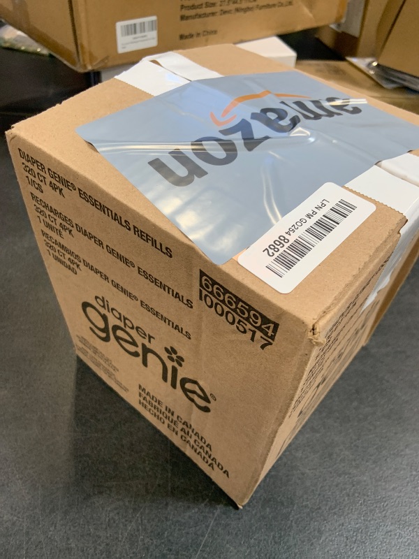 View 2 of Diaper Genie Essentials Round Refill Pack of 4 | Holds Up to 1280 Newborn Diapers | Features Unscented Continuous Film | Compatible with Diaper Genie Complete and Expressions Pails