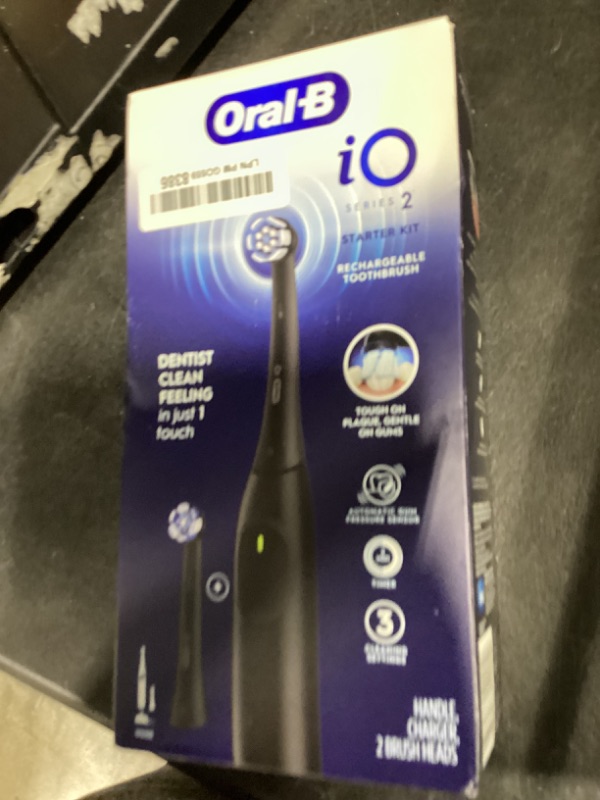 Photo 1 of Oral-B Rechargeable Electric Toothbrush, iO2 Starter Kit, 3 Cleaning Modes, Automatic Pressure Sensor to Protect Gums, 2 Brush Heads, Night Black