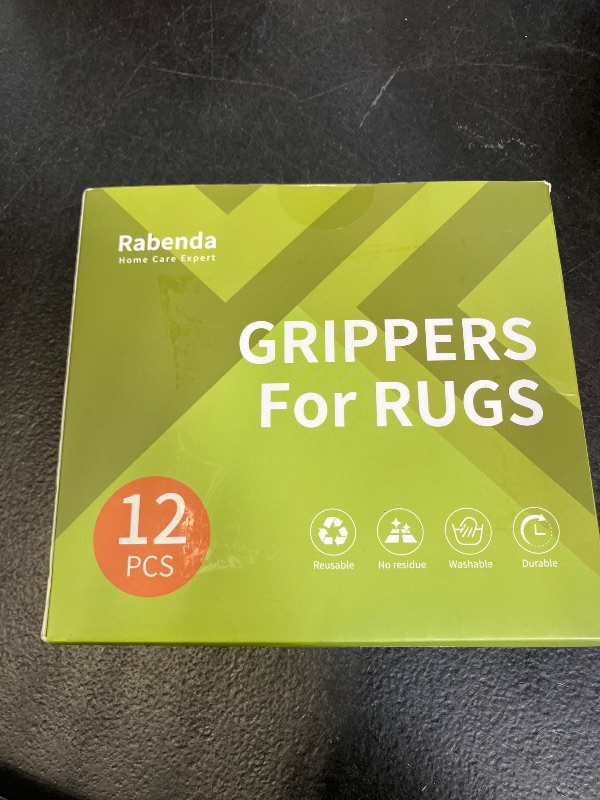 Photo 1 of Rabenda 12 Pcs Rug Tape, Non Slip Rug Pads Grippers for Hardwood Floors and Tiles, Reusable Carpet Tape for Area Rugs, Double-Sided Adhesive Rug Stickers Keep Corners Flat (Black)