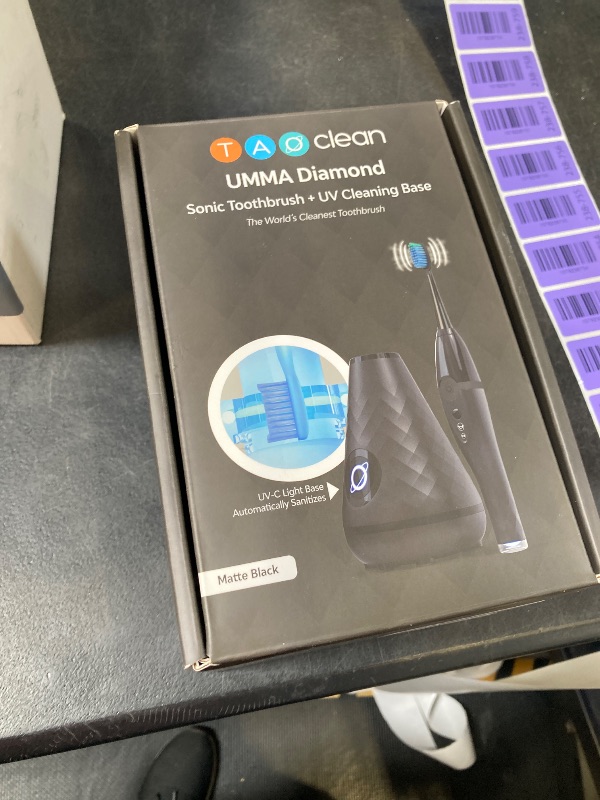 Photo 1 of Tao Clean UV Sanitizing Sonic Toothbrush and Cleaning Station, Electric Toothbrush, Dual Speed Setting, Black sealed
