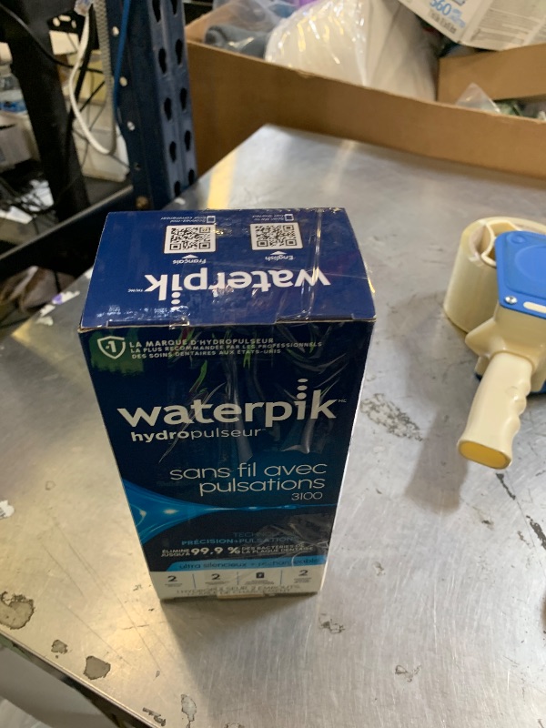Photo 1 of Waterpik Cordless Pulse 3100 Rechargeable Portable Water Flosser for Teeth, Gums, Braces Care and Travel with 2 Flossing Tips, Waterproof for Shower Use, ADA Accepted, WF-20 White, Amazon Exclusive