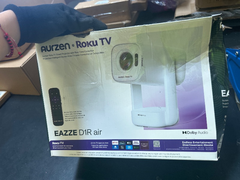 Photo 1 of Aurzen Roku TV USB-C Powered Smart Portable Projector with Wifi and Bluetooth, D1R air Roku TV Built-in, Native 1080P, DoIby Audio, Mini Projector for Home, Soccer Game/Outdoor Movies, White