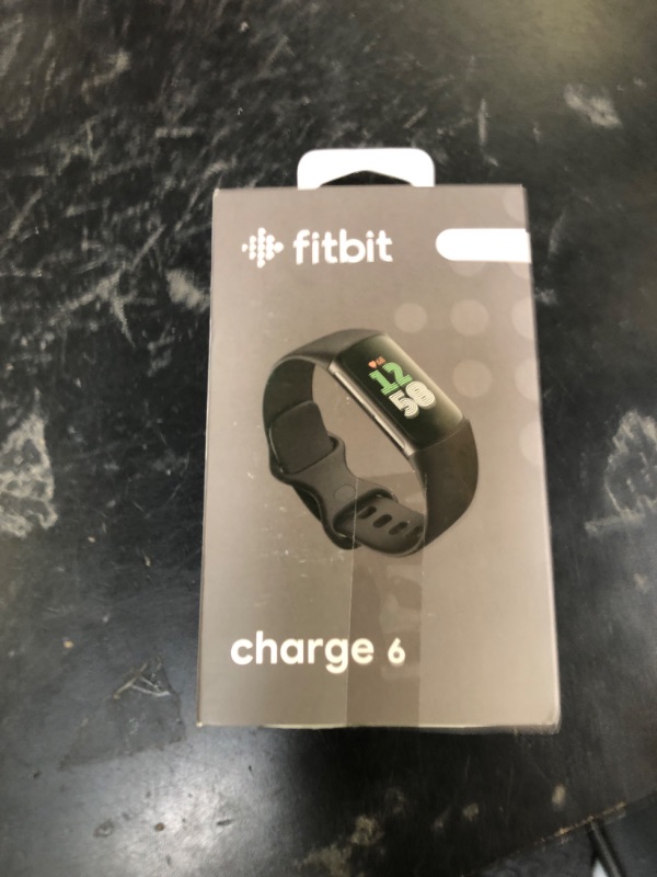 Photo 1 of Fitbit Charge 6 Fitness Tracker with Google Apps - Heart Rate on Exercise Equipment - 3-Month Google Health Premium Membership Included - Health Tools - Obsidian/Black - Small&Large Bands Included