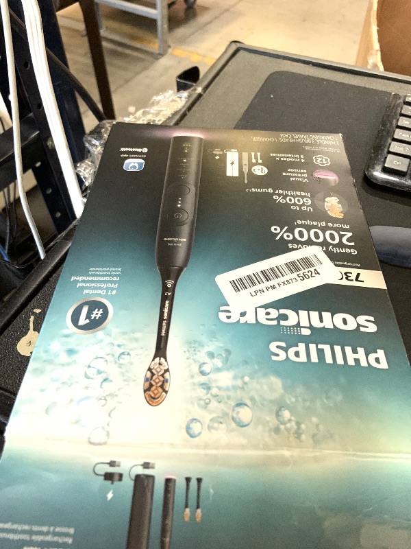 Photo 1 of Philips Sonicare 7300 Series Electric Toothbrush - Next-Generation Sonicare Technology, Pressure Sensor, 12 Brushing Settings, SmarTimer, BrushPacer, 21-Day Runtime, Travel Case, Black, HX7421/07