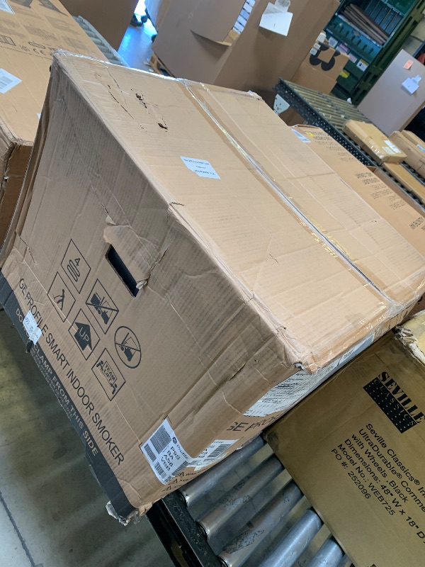 Photo 1 of GE Profile™ Smart Indoor Pellet Smoker, with Active Smoke Filtration, 5 Smoke Control Settings, WiFi Connected, Electric, Countertop BBQ Appliance, Black (dented in the corner)