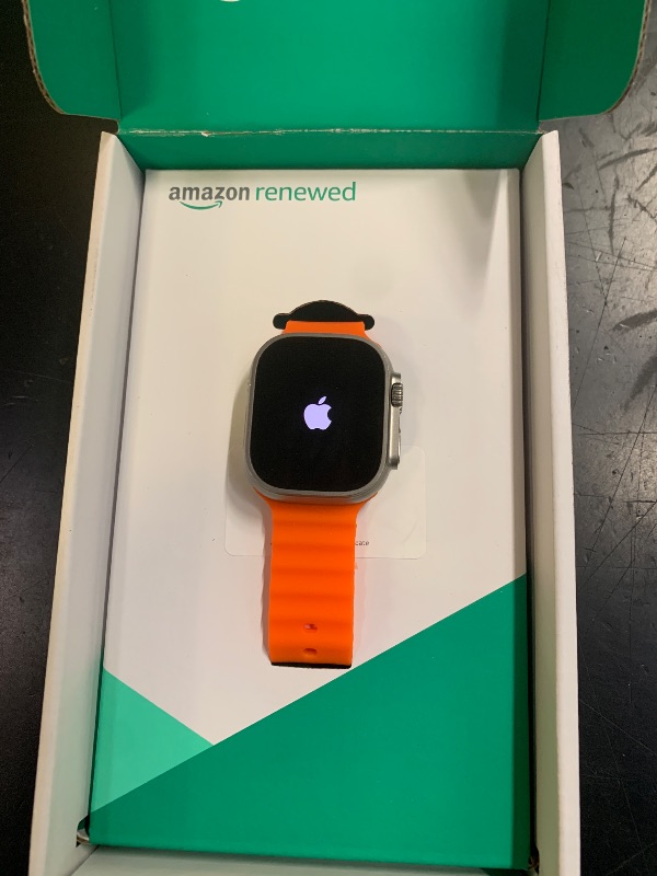 Photo 1 of Apple Watch Ultra 2 [GPS + Cellular, 49mm] - Rugged Titanium Case with Orange Ocean Band, One Size (Renewed Premium)