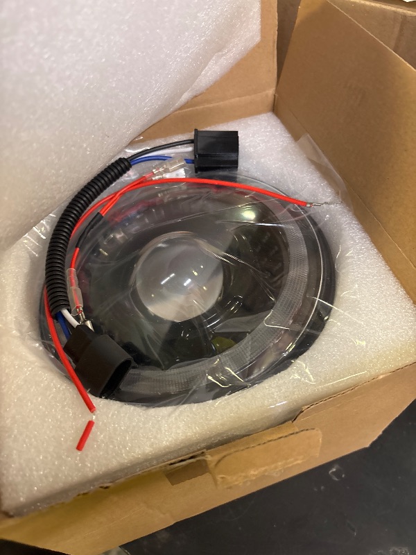 Photo 1 of HARPUOU 7 Inch Motorcycle Headlight with White/Amber DRL Start-up Gradient Welcome Halo,1pc