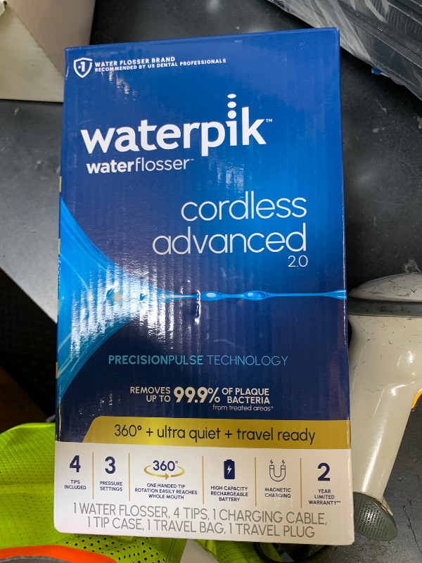 Photo 1 of Waterpik Cordless Advanced 2.0 Water Flosser For Teeth, Gums, Braces, Dental Care With Travel Bag and 4 Tips, ADA Accepted, Rechargeable, Portable, and Waterproof, Black WP-582, Packaging May Vary