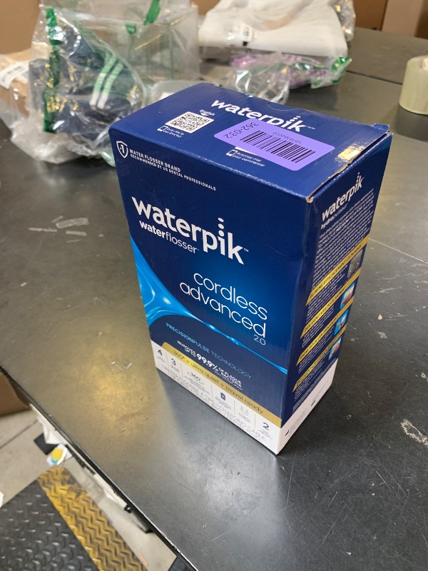 Photo 1 of Waterpik Cordless Advanced 2.0 Water Flosser For Teeth, Gums, Braces, Dental Care With Travel Bag and 4 Tips, ADA Accepted, Rechargeable, Portable, and Waterproof, White WP-580, Packaging May Vary